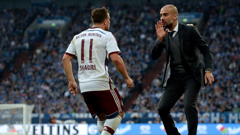 Pep Guardiola issues instructions to Xherdan Shaqiri during Bayern Munich's Bundesliga match against Schalke in August 2014