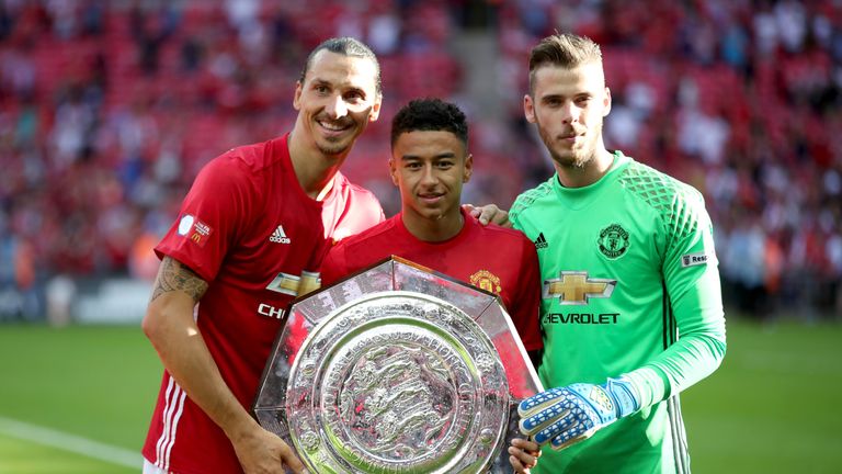Manchester United's Zlatan Ibrahimovic, Jesse Lingard and goalkeeper David De Gea celebrate with the Community Shield