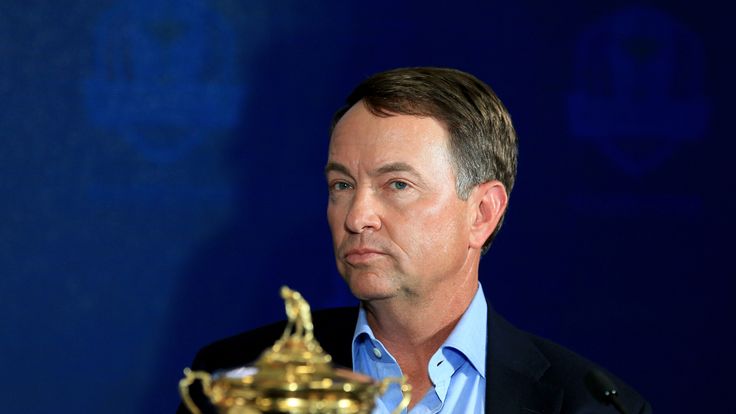 PALM BEACH GARDENS, FL - FEBRUARY 24:  Davis Love III sits beside the Ryder Cup Trophy during his announcement as the 2016 United States Ryder Cup Team Cap