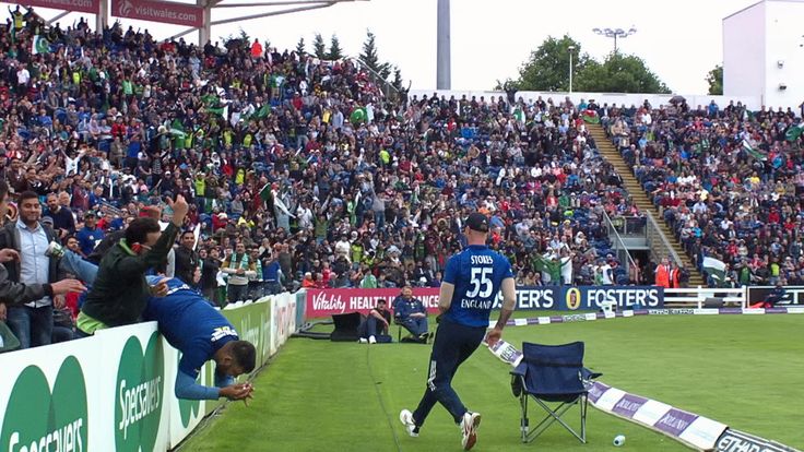 Fan topples over the boundary edge but clings on