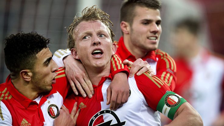 Feyenoords' Dirk Kuyt (C) is congratulated by temmates after scoring the first goal against Roda JC during the Eredivisie match between Feyenoord and Roda 