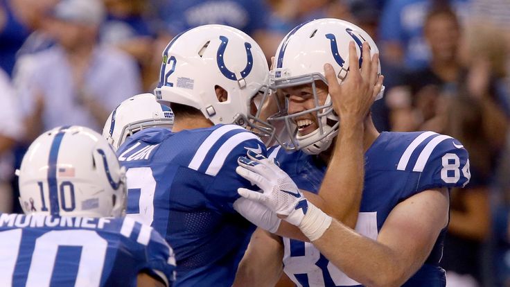 INDIANAPOLIS, IN - SEPTEMBER 11: Andrew Luck #12 of the Indianapolis Colts and Jack Doyle #84 of the Indianapolis Colts celebrate after the two connected f