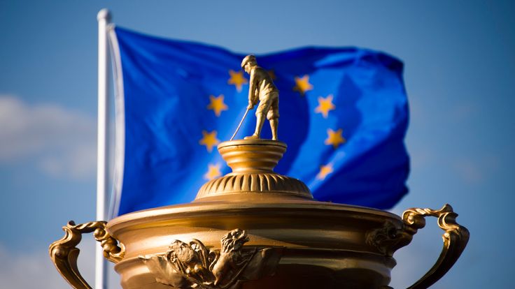 The European Union flag flies behind a statue of the Ryder Cup trophy at Hazeltine National Golf Course in Chaska, Minnesota, September 26, 2016, ahead of 