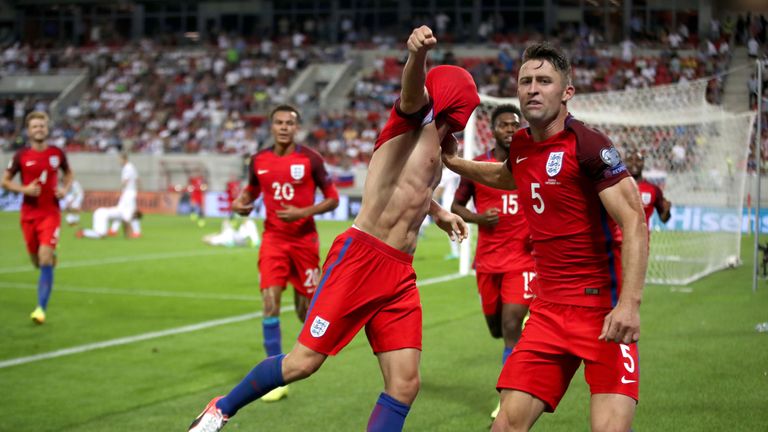 England's Adam Lallana celebrates scoring his side's first goal of the game with teammates during the 2018 FIFA World Cup Qualifying match at the City Aren