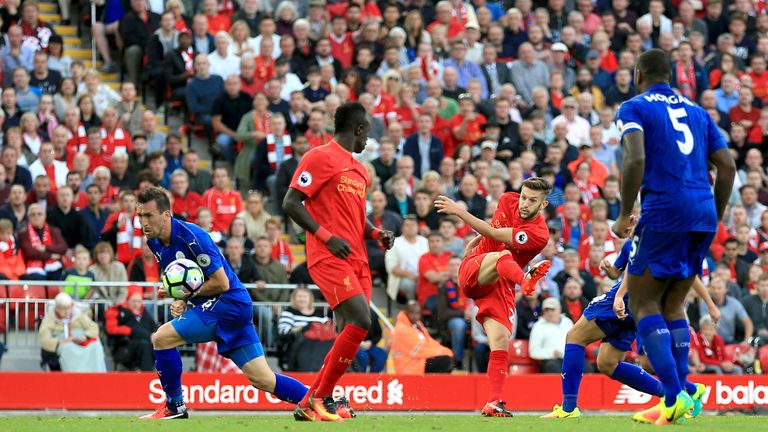 Liverpool's Adam Lallana (2ndR) scores his side's third goal of the game