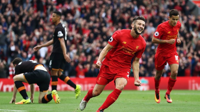 LIVERPOOL, ENGLAND - SEPTEMBER 24: Adam Lallana of Liverpool scores his sides first goal during the Premier League match between Liverpool and Hull City at