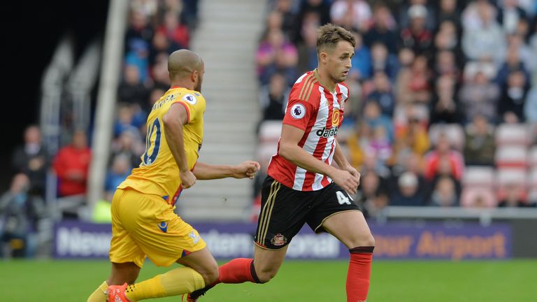 Adnan Januzaj of Sunderland takes the ball past Andros Townsend of Crystal Palace 