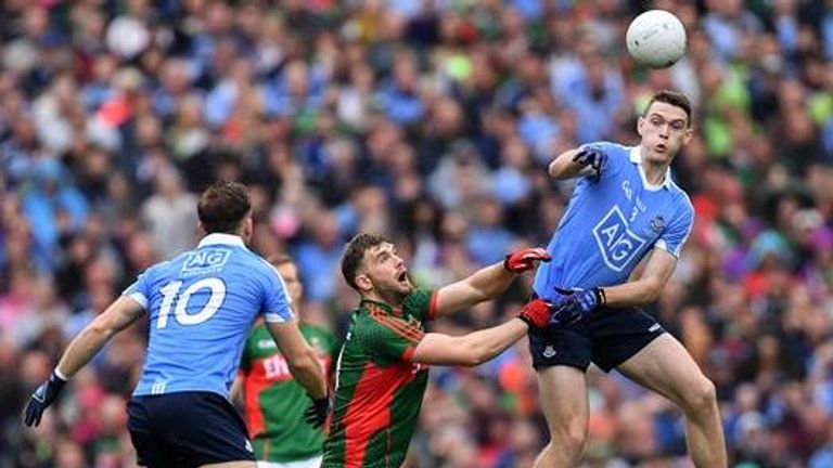 Mayo's Aidan O'Shea challenges Dublin's Brian Fenton in the All-Ireland football final.