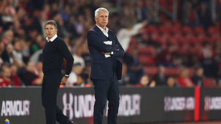 SOUTHAMPTON, ENGLAND - SEPTEMBER 21: Alan Pardew, Manager of Crystal Palace and Claude Puel, Manager of Southampton look on during the EFL Cup Third Round 