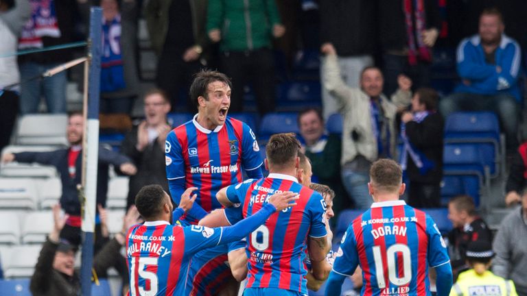 Inverness Caley Thistle's Alex Fisher (hidden) celebrates his goal