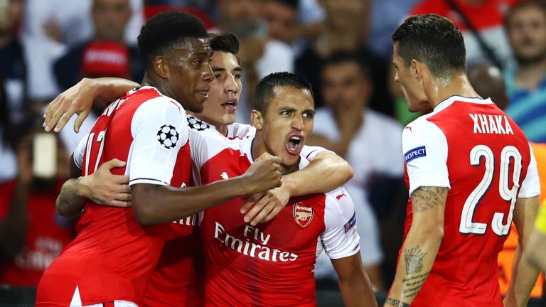 Alexis Sanchez celebrates after scoring for Arsenal against PSG
