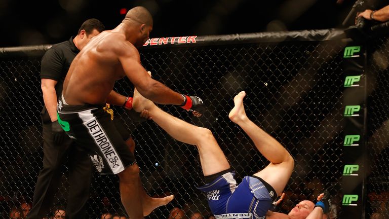 PHOENIX, AZ - DECEMBER 13:  Alistair Overeem (L) avoids kicks from Stefan Struve in their heavyweight bout during the UFC Fight Night event at the at U.S. 