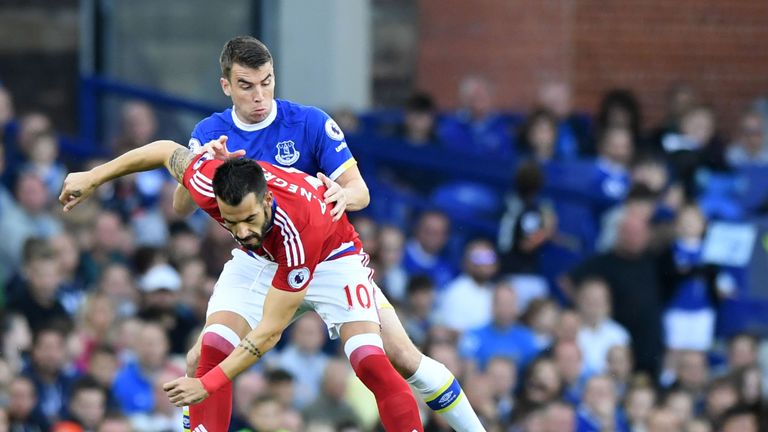 Middlesbrough's Spanish striker Alvaro Negredo (L) holds off Everton's Costa Rican midfielder Bryan Oviedo 