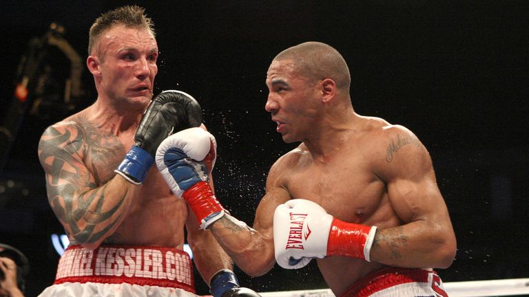 OAKLAND, CA - NOVEMBER 21:  Mikkel Kessler of Denmark (L) is hit by Andre Ward during their WBA Super Middleweight Championship Bout at the Oakland-Alameda