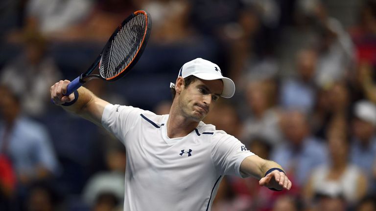 Andy Murray reacts after losing a game against Kei Nishikori 