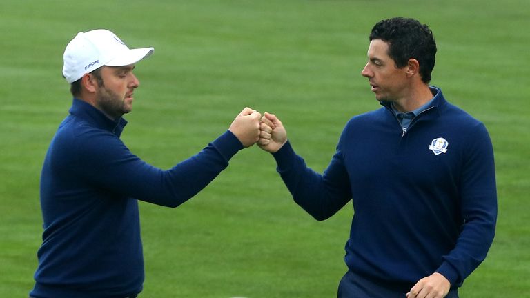 Andy Sullivan and Rory McIlroy of Europe react on the third hole during morning foursome matches of the 2016 Ryder Cup at Hazeltine