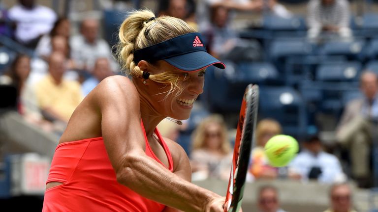 Angelique Kerber of Germany returns a shot against Roberta Vinci of Italy during their 2016 US Open Women's quarterfinals match at the USTA Billie Jean Kin