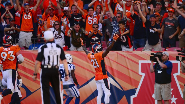 DENVER, CO - SEPTEMBER 18:  Cornerback Aqib Talib #21 of the Denver Broncos celebrates after intercepting the ball and scoring a touchdown in the fourth qu