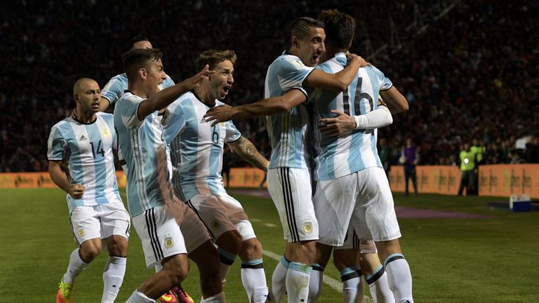 Argentina's Lionel Messi celebrates with teammates after scoring against Uruguay during the FIFA World Cup 2018 qualifier football match between Argentina 