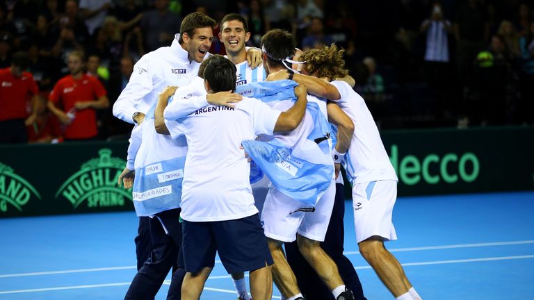 Leonardo Mayer of Argentina celebrates with his team-mates