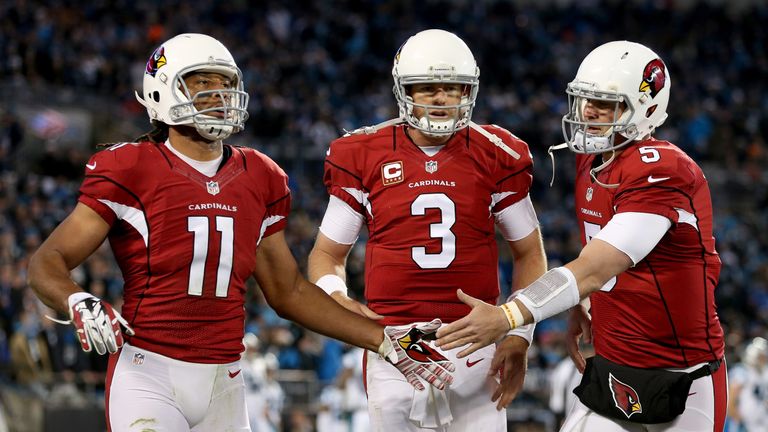 CHARLOTTE, NC - JANUARY 24:  (L-R) Larry Fitzgerald #11 of the Arizona Cardinals, Carson Palmer #3, and Drew Stanton #5 react after David Johnson #31 (not 