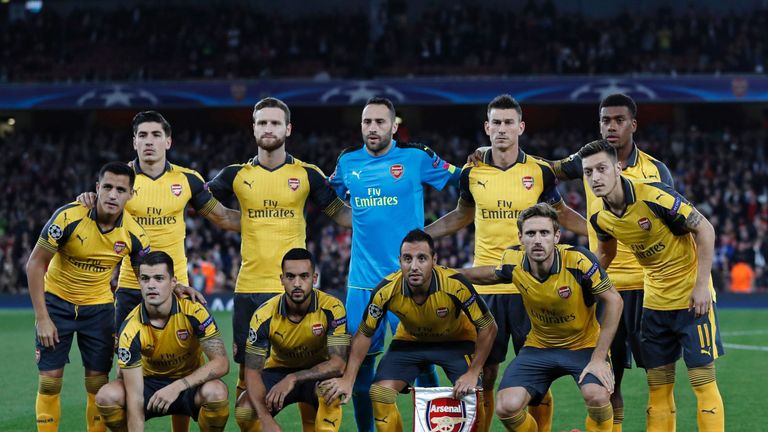 Arsenal line up for their Champions League game with Basel in away colours after a kit clash