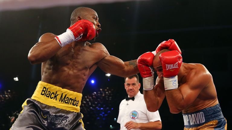Arthur Abraham (L) of Germany exchanges punches with Willbeforce Shihepo (R) 