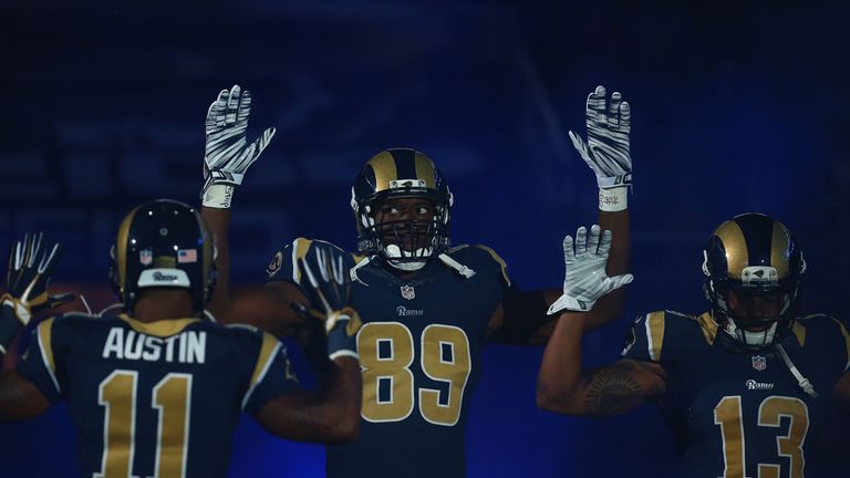 ST. LOUIS, MO - NOVEMBER 30: Tavon Austin #11, Jared Cook #89, Chris Givens #13 of the St. Louis Rams pay homage to Mike Brown by holding their hands up du