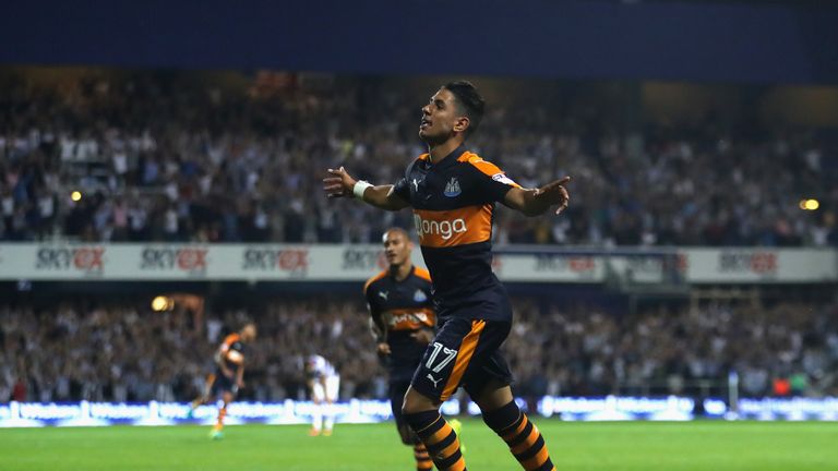 Ayoze Perez of Newcastle United celebrates after scoring against QPR