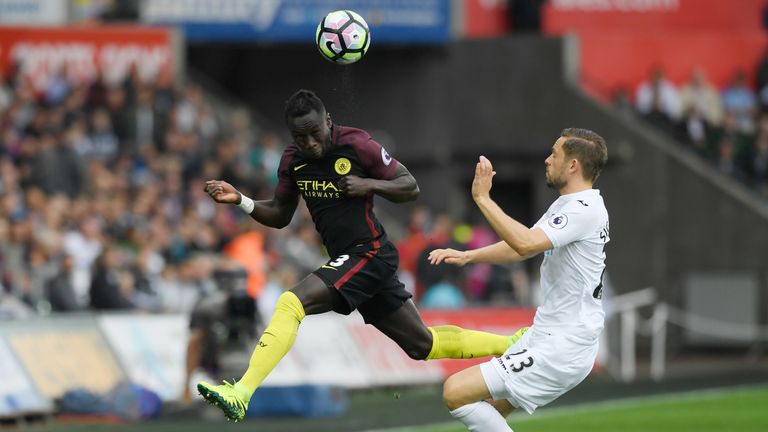 Bacary Sagna of Manchester City heads the ball