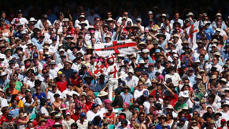 SYDNEY, AUSTRALIA - JANUARY 03:  English fan Vic Flowers (C) leads the Barmy Army in song during day one of the Fifth Ashes Test match between Australia an