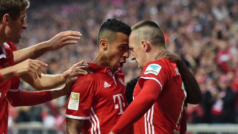 Franck Ribery (right) celebrates after scoring for Bayern