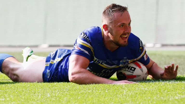 Ben Currie scores a try for Warrington in the Challenge Cup final against Hull