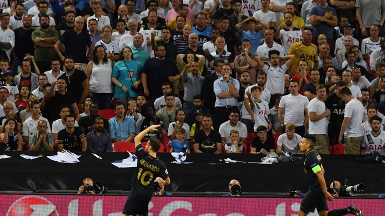 Monaco's Portuguese midfielder Bernardo Silva (L) celebrates after scoring against Tottenham