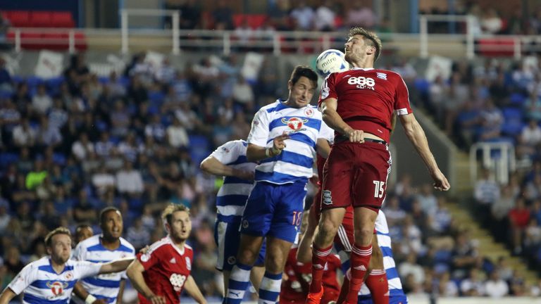 Birmingham City's Lukas Jutkiewicz challenges against Reading