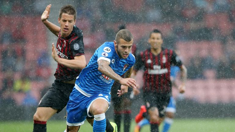 AFC Bournemouth's Jack Wilshere gets past AC Milan's Mario Paselic during the friendly match at the Vitality Stadium, Bournemouth.