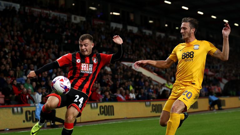 Ben Davies of Preston North End attempts to stop a cross from Ryan Fraser