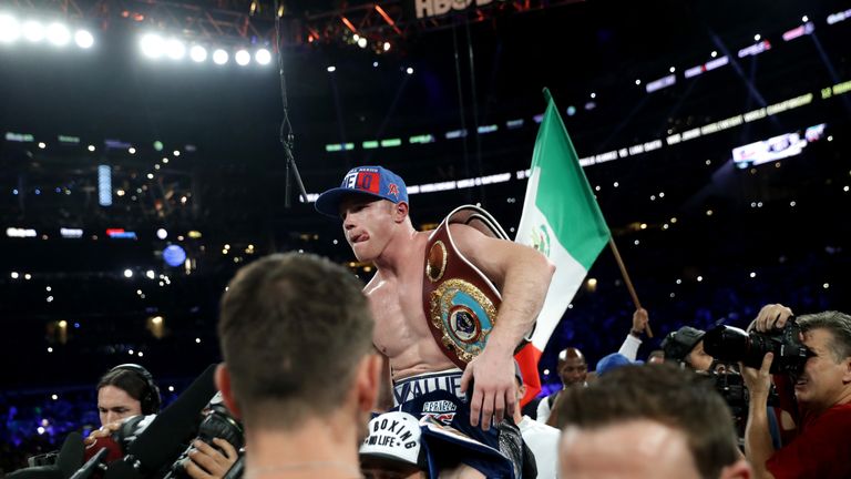 ARLINGTON, TX - SEPTEMBER 17: Canelo Alvarez celebrates after knocking out Liam Smith during the WBO Junior Middleweight World fight at AT&T Stadium on Sep