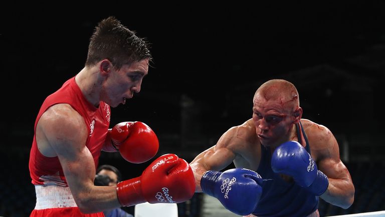 RIO DE JANEIRO, BRAZIL - AUGUST 16:  Vladimir Nikitin (R) of Russia fights Michael John Conlan of Ireland in the boxing  Men's Bantam (56kg) Quarterfinal 1