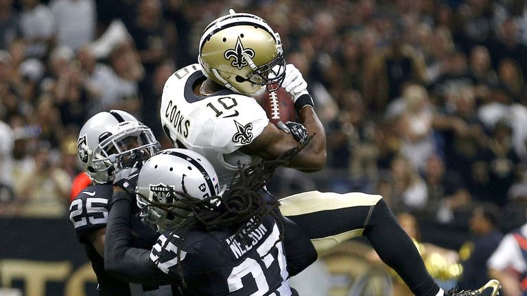 NEW ORLEANS, LA - SEPTEMBER 11: Brandin Cooks #10 of the New Orleans Saints catches the ball for a touchdown over Reggie Nelson #27 of the Oakland Raiders 