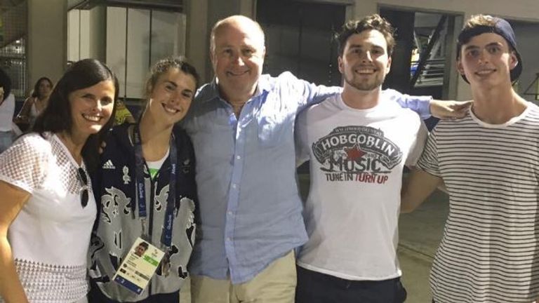 Olivia (second L) was closely supported by her family in Rio