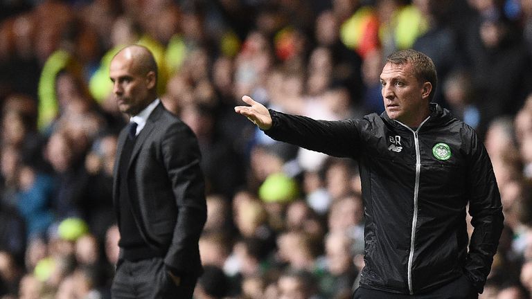 Brendan Rodgers [right] hailed his Celtic players after their draw with Pep Guardiola's Man City