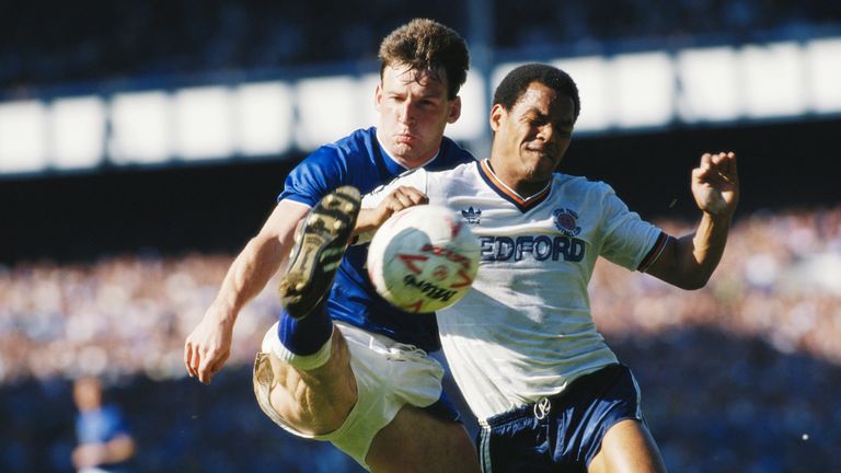 Dave Watson of Everton F.C challenges Brian Stein of Luton Town F.C during their League Division One match on 9th May 1987 at Goodison Park, England.  (Pho