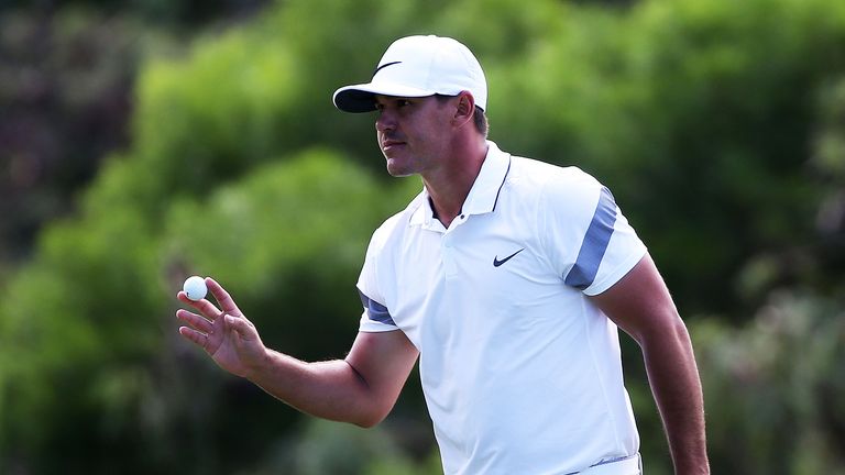 LAHAINA, HI - JANUARY 09:  Brooks Koepka holds up his ball after putting on the eighth green during the third round of the Hyundai Tournament of Champions 