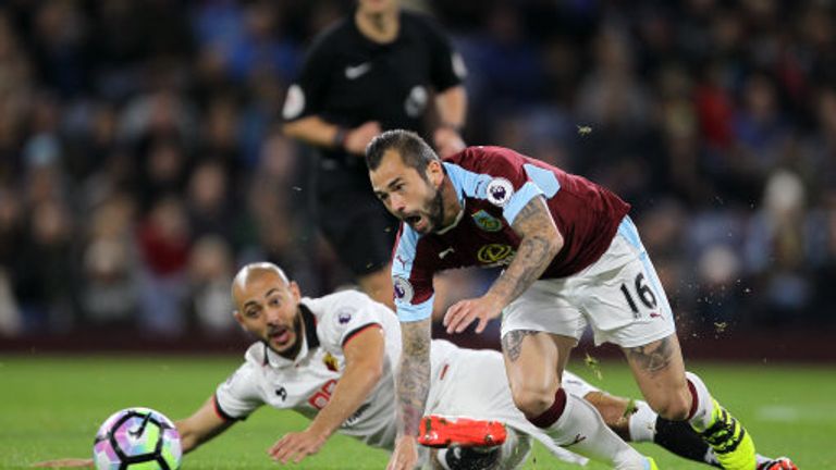 Burnley's Steven Defour (right) and Watford's Nordin Amrabat battle for the ball 
