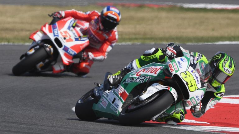 Briton Cal Crutchlow (35) leads Michele Pirro at Misano on Sunday