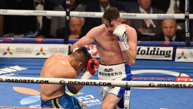 LONDON, ENGLAND - SEPTEMBER 10:  Callum Smith of Great Britain in boxing action with Norbert Nemesapati of Hungary for the WBC Silver Super Middleweight ti