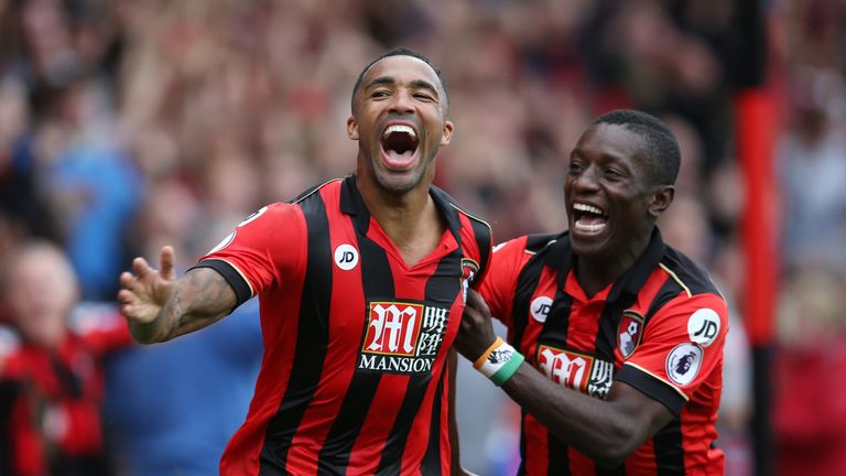 Callum Wilson of AFC Bournemouth (L) celebrates scoring his sides first goal with Max Gradel