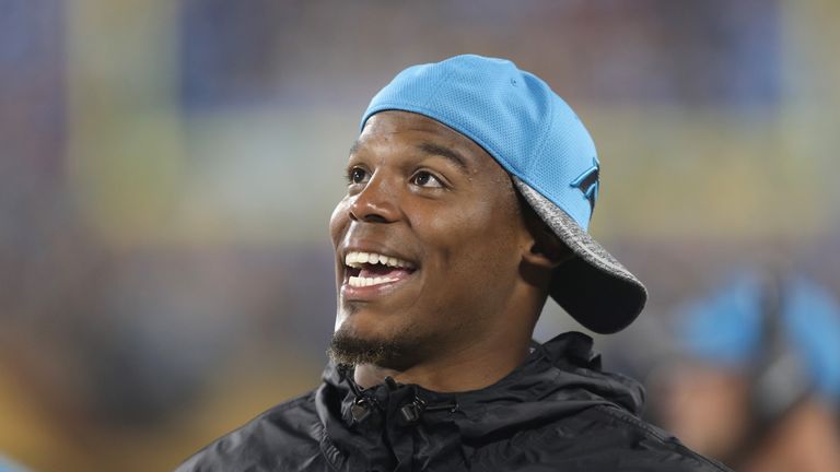 CHARLOTTE, NC - SEPTEMBER 01:   Cam Newton #1 of the Carolina Panthers checks the scoreboard during their 