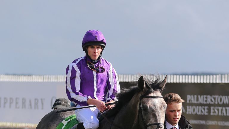 Capri ridden by Ryan Moore in the parade ring after winning the Juddmonte Beresford Stakes